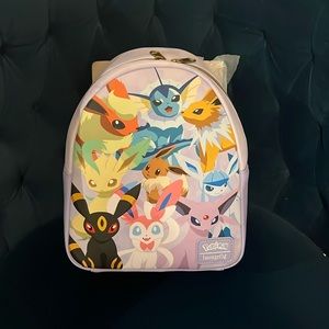 Loungefly purple Eevee evolution mini back pack.